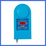 A blue electronic device with a circular top and a rectangular control panel below it. The control panel has a small red LED screen with blue buttons on either side. The device also features a cable emerging from the bottom. | AES - Pool Heating & Energy Efficient Products