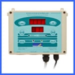 A rectangular electrical device with a beige frame and a blue-green front panel displays red LED digital numbers. It has multiple buttons, labels, and two cables connected at the bottom. | AES - Pool Heating & Energy Efficient Products